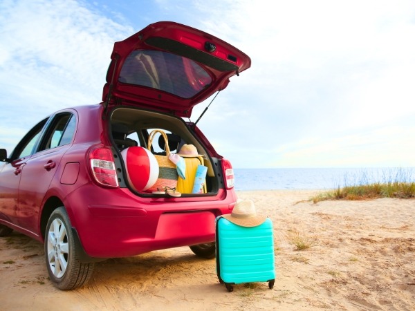 Car and Luggage on a Beach