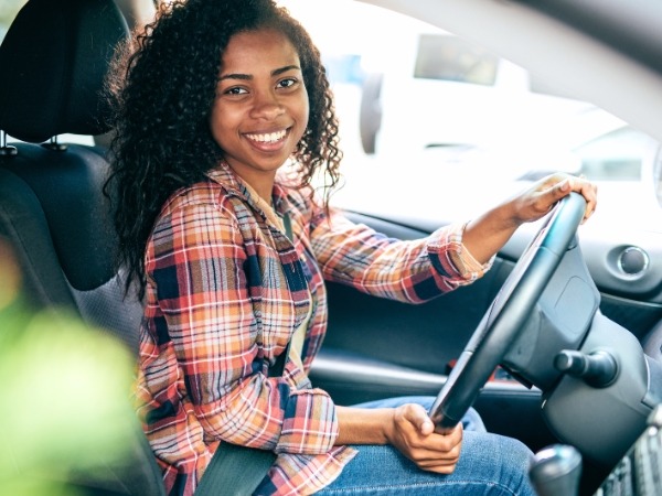 Woman Driving a Car
