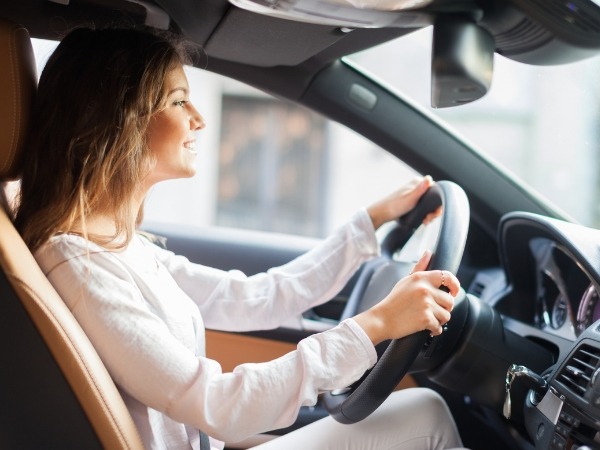 Woman Driving a Car