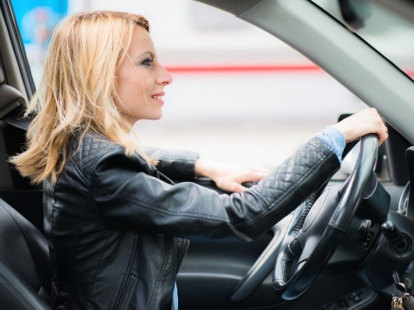 Woman Driving a Car